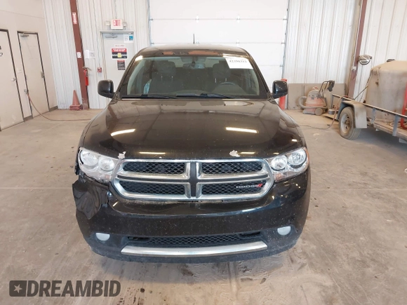 2013 Dodge Durango SXT with VIN 1C4RDJAG1DC681416, listed as a IAAI auction lot 42390313 with 222,022 mi miles and . Bid and sale history available at DreamBid. Image 12.