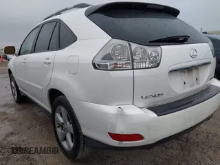 2005 Lexus RX 330 with VIN JTJGA31UX50054571, listed as a IAAI auction lot 42193763 with 215,321 mi miles. Bid and sale history available at carsss.com. Image 6.