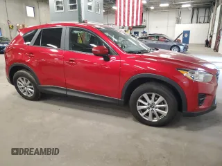 2016 Mazda CX-5 Touring z VIN JM3KE4CY7G0898598, wystawiony jako Copart lot #56717895 z przebiegiem 103 548 mil mil oraz Szkoda całkowita • Salvage title. Historia ofert i sprzedaży dostępna na DreamBid. Obrazek 4.