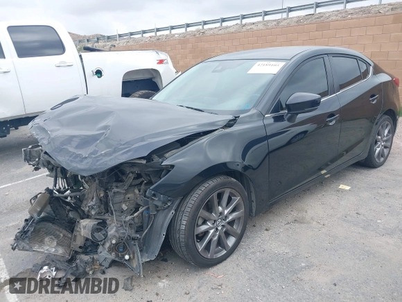 2018 Mazda 3 Touring with VIN 3MZBN1V30JM201671, listed as a IAAI auction lot 42189105 with 174,284 mi miles and . Bid and sale history available at carsss.com. Image 17.