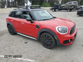 2019 MINI Countryman Cooper with VIN WMZYV5C56K3E82468, listed as a Copart auction lot 55530385 with 71,186 mi miles and Salvage title. Bid and sale history available at DreamBid. Image 4.