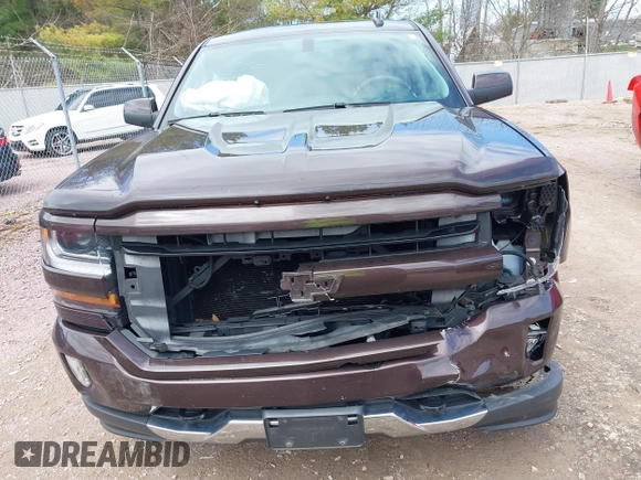 2016 Chevrolet Silverado 1500 LT with VIN 3GCUKREC3GG305792, listed as a IAAI auction lot 42083847 with 72,325 mi miles and . Bid and sale history available at DreamBid. Image 13.