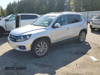2012 Volkswagen Tiguan SE z VIN WVGAV7AXXCW513800, wystawiony jako Copart lot #53005945 z przebiegiem 155 920 mil mil oraz Tytuł czysty. Historia ofert i sprzedaży dostępna na DreamBid. Obrazek 1.
