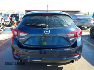 2018 Mazda 3 Touring z VIN 3MZBN1L36JM238646, wystawiony jako IAAI lot #41376772 z przebiegiem 97 261 mil mil oraz . Historia ofert i sprzedaży dostępna na DreamBid. Obrazek 16.