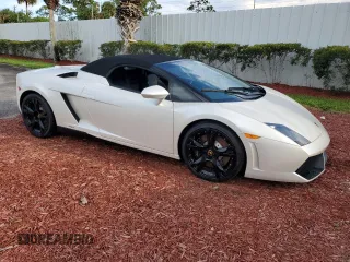 2012 Lamborghini Gallardo z VIN ZHWGU6BZ7CLA11933, wystawiony jako Copart lot #74679154 z przebiegiem Nie podano mil oraz Szkody całkowita. Historia ofert i sprzedaży dostępna na DreamBid. Obrazek 4.