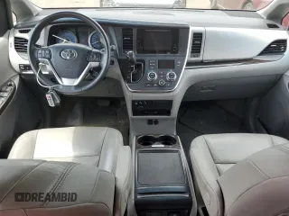 2017 Toyota Sienna XLE with VIN 5TDDZ3DC0HS150633, listed as a Copart auction lot 62642575 with 94,439 mi miles and Salvage title. Bid and sale history available at DreamBid. Image 8.