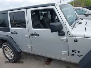 2008 Jeep Wrangler Unlimited X with VIN 1J4GA39108L510829, listed as a IAAI auction lot 42069589 with 108,696 mi miles and . Bid and sale history available at DreamBid. Image 14.