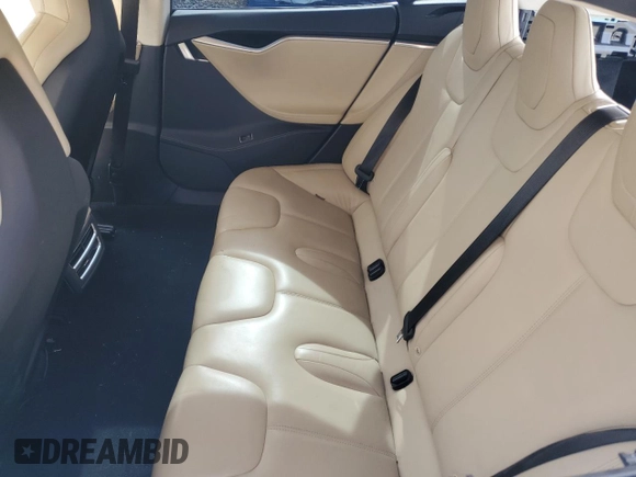 2016 Tesla Model S 90D with VIN 5YJSA1E27GF142380, listed as a Copart auction lot 50661905 with 104,865 mi miles and Salvage Title. Bid and sale history available at DreamBid. Image 10.