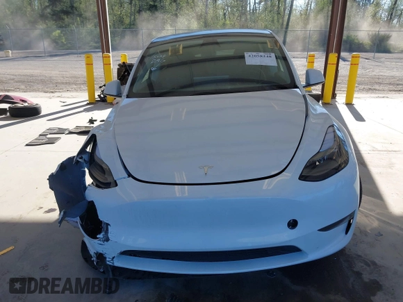 2024 Tesla Model Y Long Range with VIN 7SAYGAEEXRF988561, listed as a IAAI auction lot 42058248 with 7,845 mi miles. Bid and sale history available at carsss.com. Image 12.