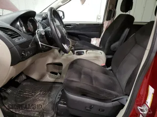 2014 Dodge Grand Caravan SXT z VIN 2C4RDGCG2ER239110, wystawiony jako Copart lot #57247855 z przebiegiem 94 126 mil mil oraz Nie do naprawy. Historia ofert i sprzedaży dostępna na DreamBid. Obrazek 7.