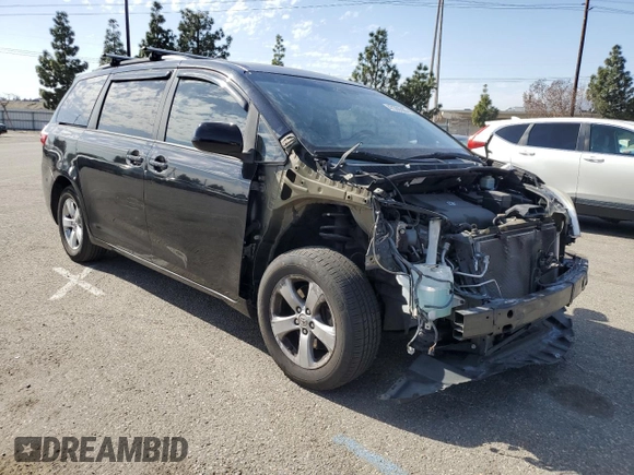2015 Toyota Sienna LE AAS with VIN 5TDKK3DC8FS610940, listed as a Copart auction lot 47390285 with 128,893 mi miles and Salvage Title. Bid and sale history available at carsss.com. Image 4.