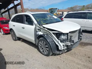 2016 Acura MDX w/Tech with VIN 5FRYD4H43GB014801, listed as a IAAI auction lot 39256120 with 73,769 mi miles. Bid and sale history available at carsss.com. Image 1.
