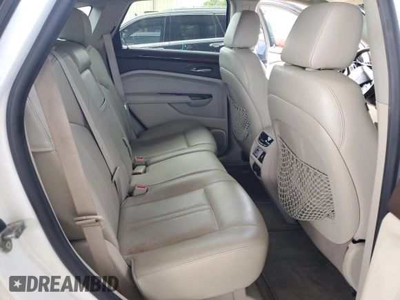 2013 Cadillac SRX Premium Collection with VIN 3GYFNEE30DS529808, listed as a Copart auction lot 61931185 with 131,245 mi miles and Salvage title. Bid and sale history available at DreamBid. Image 10.