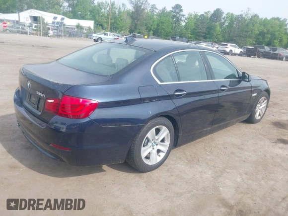 2013 BMW 5 Series 528i with VIN WBAXG5C52DD230956, listed as a IAAI auction lot 42107778 with 126,377 mi miles and . Bid and sale history available at carsss.com. Image 4.