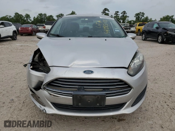 2014 Ford Fiesta S с VIN 3FADP4AJ6EM127809, выставлен на аукционе Copart как лот 54985085 с пробегом 136 257 миль миль и Списание • Salvage title. История ставок и продаж доступна на DreamBid. Изображение 5.