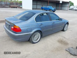 2001 BMW 3 Series 330i with VIN WBAAV53491JS94217, listed as a IAAI auction lot 42039234 with 128,977 mi miles. Bid and sale history available at carsss.com. Image 4.