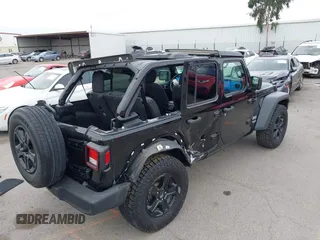 2018 Jeep Wrangler Unlimited Sport S with VIN 1C4HJXDG8JW105612, listed as a IAAI auction lot 42420765 with 54,873 mi miles and . Bid and sale history available at DreamBid. Image 6.