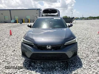 2023 Honda Civic EX-L z VIN 19XFL1H72PE010913, wystawiony jako Copart lot #51608005 z przebiegiem 35 961 mil mil oraz Szkoda całkowita • Salvage title. Historia ofert i sprzedaży dostępna na DreamBid. Obrazek 14.