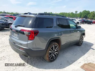 2021 GMC Acadia SLE with VIN 1GKKNRLS3MZ147270, listed as a IAAI auction lot 42211633 with 94,884 mi miles and . Bid and sale history available at DreamBid. Image 4.