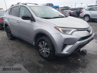 2016 Toyota RAV4 LE with VIN 2T3ZFREV5GW251763, listed as a IAAI auction lot 41655532 with 147,873 mi miles. Bid and sale history available at carsss.com. Image 1.