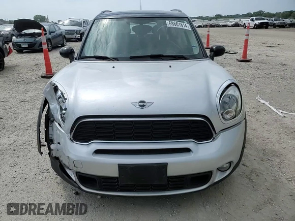 2014 MINI Countryman S with VIN WMWZC5C55EWM18087, listed as a Copart auction lot 68661614 with Not provided miles and Salvage title. Bid and sale history available at DreamBid. Image 11.