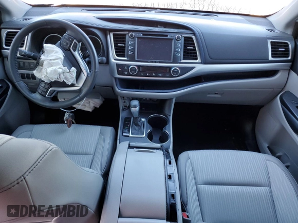 2019 Toyota Highlander LE z VIN 5TDZZRFH2KS312304, wystawiony jako Copart lot #41061594 z przebiegiem 27 969 mil mil oraz Nie do naprawy • Non repairable. Historia ofert i sprzedaży dostępna na DreamBid. Obrazek 8.
