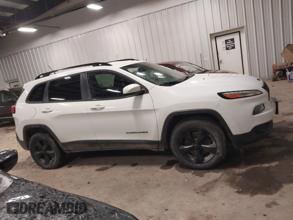 2016 Jeep Cherokee Latitude with VIN 1C4PJMCB0GW226093, listed as a IAAI auction lot 41683652 with 130,168 mi miles and . Bid and sale history available at DreamBid. Image 13.