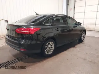 2015 Ford Focus SE with VIN 1FADP3F29FL203084, listed as a IAAI auction lot 42357973 with 99,002 mi miles and . Bid and sale history available at DreamBid. Image 4.