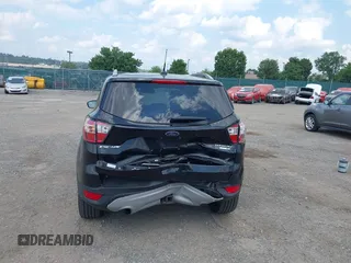 2018 Ford Escape Titanium z VIN 1FMCU9J9XJUB66275, wystawiony jako IAAI lot #42757952 z przebiegiem 97 629 mil mil oraz . Historia ofert i sprzedaży dostępna na DreamBid. Obrazek 16.
