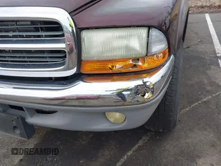 2004 Dodge Dakota SLT with VIN 1D7HG48NX4S751497, listed as a IAAI auction lot 41737935 with 106,064 mi miles. Bid and sale history available at carsss.com. Image 6.