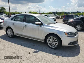 2013 Volkswagen Jetta TDI w/Premium with VIN 3VWLL7AJ4DM385387, listed as a Copart auction lot 63132695 with 132,468 mi miles and Clean title. Bid and sale history available at DreamBid. Image 4.