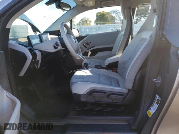 2015 BMW i3 with VIN WBY1Z4C56FV500991, listed as a Copart auction lot 43162913 with 57,885 mi miles. Bid and sale history available at carsss.com. Image 7.