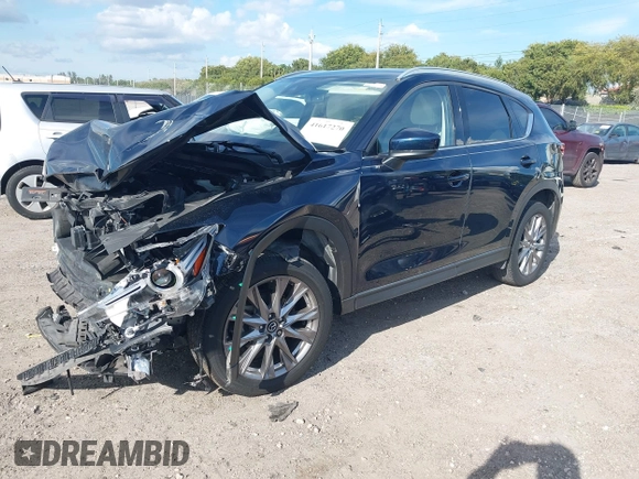 2021 Mazda CX-5 Grand Touring with VIN JM3KFADM0M0469886, listed as a IAAI auction lot 41617270 with 33,571 mi miles. Bid and sale history available at carsss.com. Image 18.