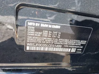2020 BMW M5 with VIN WBSJF0C05LCE51499, listed as a IAAI auction lot 41982940 with 47,076 mi miles. Bid and sale history available at carsss.com. Image 9.