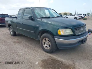 2001 Ford F-150 XL z VIN 1FTZX17221NB70154, wystawiony jako IAAI lot #42410776 z przebiegiem 173 864 mil mil oraz . Historia ofert i sprzedaży dostępna na DreamBid. Obrazek 1.