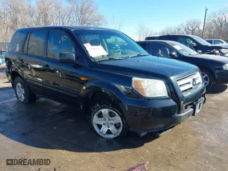 2007 Honda Pilot LX with VIN 5FNYF18187B018956, listed as a IAAI auction lot 41661710 with 228,447 mi miles. Bid and sale history available at carsss.com. Image 1.