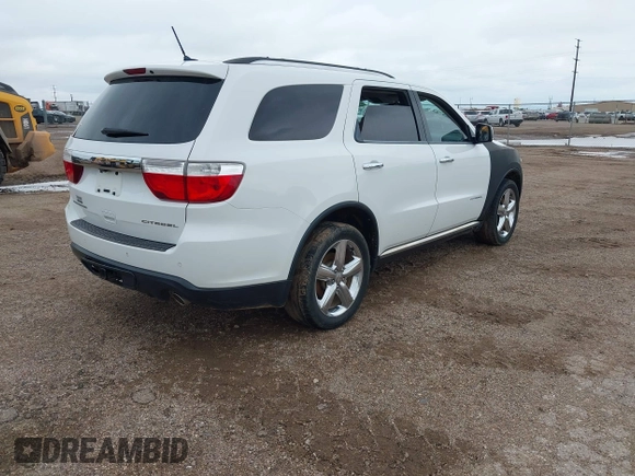 2013 Dodge Durango Citadel with VIN 1C4RDHEG2DC672632, listed as a IAAI auction lot 42432340 with 246,901 mi miles and . Bid and sale history available at DreamBid. Image 4.