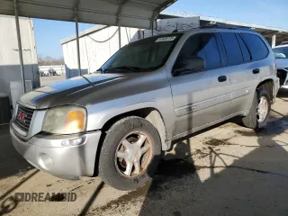 2005 GMC Envoy SLE with VIN 1GKDS13S852374516, listed as a Copart auction lot 42409725 with 299,816 mi miles and Salvage Title. Bid and sale history available at carsss.com. Image 1.