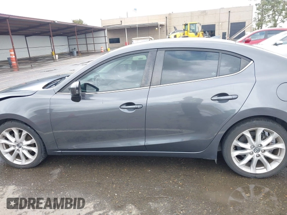 2014 Mazda 3 S Touring with VIN JM1BM1V31E1132448, listed as a IAAI auction lot 41815085 with 144,705 mi miles and . Bid and sale history available at DreamBid. Image 14.