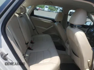 2012 Volkswagen Passat SE z VIN 1VWBP7A38CC091797, wystawiony jako Copart lot #62032205 z przebiegiem 198 594 mil mil oraz Czysty tytuł • Clean title. Historia ofert i sprzedaży dostępna na DreamBid. Obrazek 10.