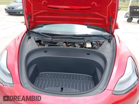 2023 Tesla Model 3 with VIN 5YJ3E1EA0PF455058, listed as a IAAI auction lot 42201618 with 31,147 mi miles and . Bid and sale history available at DreamBid. Image 10.