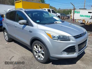 2016 Ford Escape Titanium with VIN 1FMCU9JXXGUA51537, listed as a IAAI auction lot 42118922 with 109,439 mi miles. Bid and sale history available at carsss.com. Image 1.