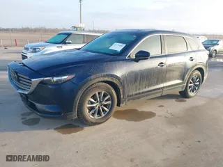 2021 Mazda CX-9 Touring with VIN JM3TCACYXM0516875, listed as a IAAI auction lot 41175400 with 64,429 mi miles. Bid and sale history available at carsss.com. Image 16.