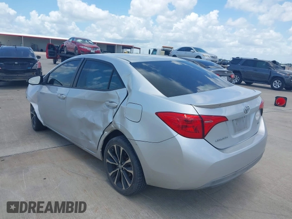 2017 Toyota Corolla L z VIN 5YFBURHE4HP732912, wystawiony jako IAAI lot #42451597 z przebiegiem 73 901 mil mil oraz . Historia ofert i sprzedaży dostępna na DreamBid. Obrazek 3.