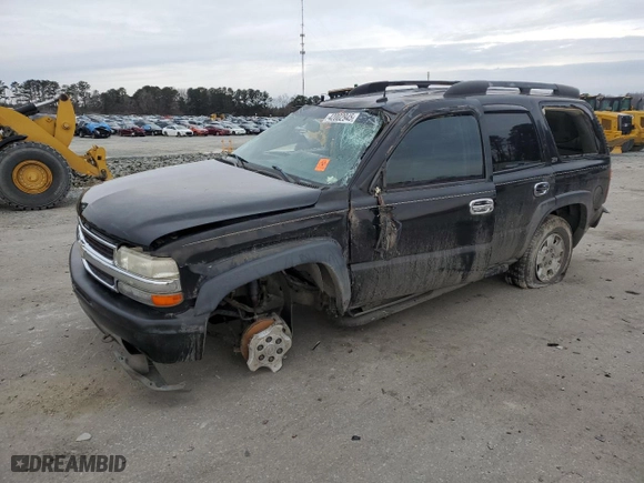 2003 Chevrolet Tahoe Z71 with VIN 1GNEK13T03R124255, listed as a Copart auction lot 42002945 with 205,965 mi miles and Salvage Title. Bid and sale history available at carsss.com. Image 1.