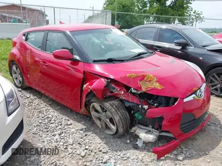 2012 Hyundai Veloster w/Black Int z VIN KMHTC6AD7CU049570, wystawiony jako IAAI lot #42265051 z przebiegiem 79 896 mil mil oraz . Historia ofert i sprzedaży dostępna na DreamBid. Obrazek 1.