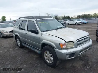 2003 Nissan Pathfinder SE with VIN JN8DR09Y73W810814, listed as a IAAI auction lot 41955769 with 303,335 mi miles. Bid and sale history available at carsss.com. Image 1.
