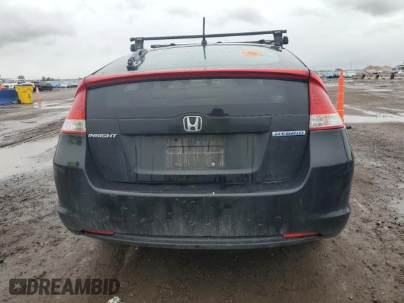 2010 Honda Insight LX with VIN JHMZE2H59AS022362, listed as a Copart auction lot 59442435 with 161,009 mi miles and Salvage title. Bid and sale history available at DreamBid. Image 6.