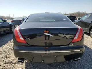 2012 Jaguar XJ with VIN SAJWA1CB5CLV29023, listed as a Copart auction lot 48300165 with 42,725 mi miles and Salvage title. Bid and sale history available at DreamBid. Image 6.