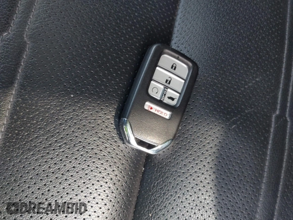 2020 Honda CR-V Touring z VIN 2HKRW2H9XLH623380, wystawiony jako IAAI lot #42039028 z przebiegiem 59 795 mil mil oraz . Historia ofert i sprzedaży dostępna na DreamBid. Obrazek 11.